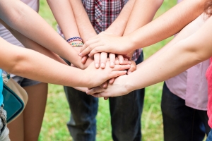 Teens’ hands toghether
